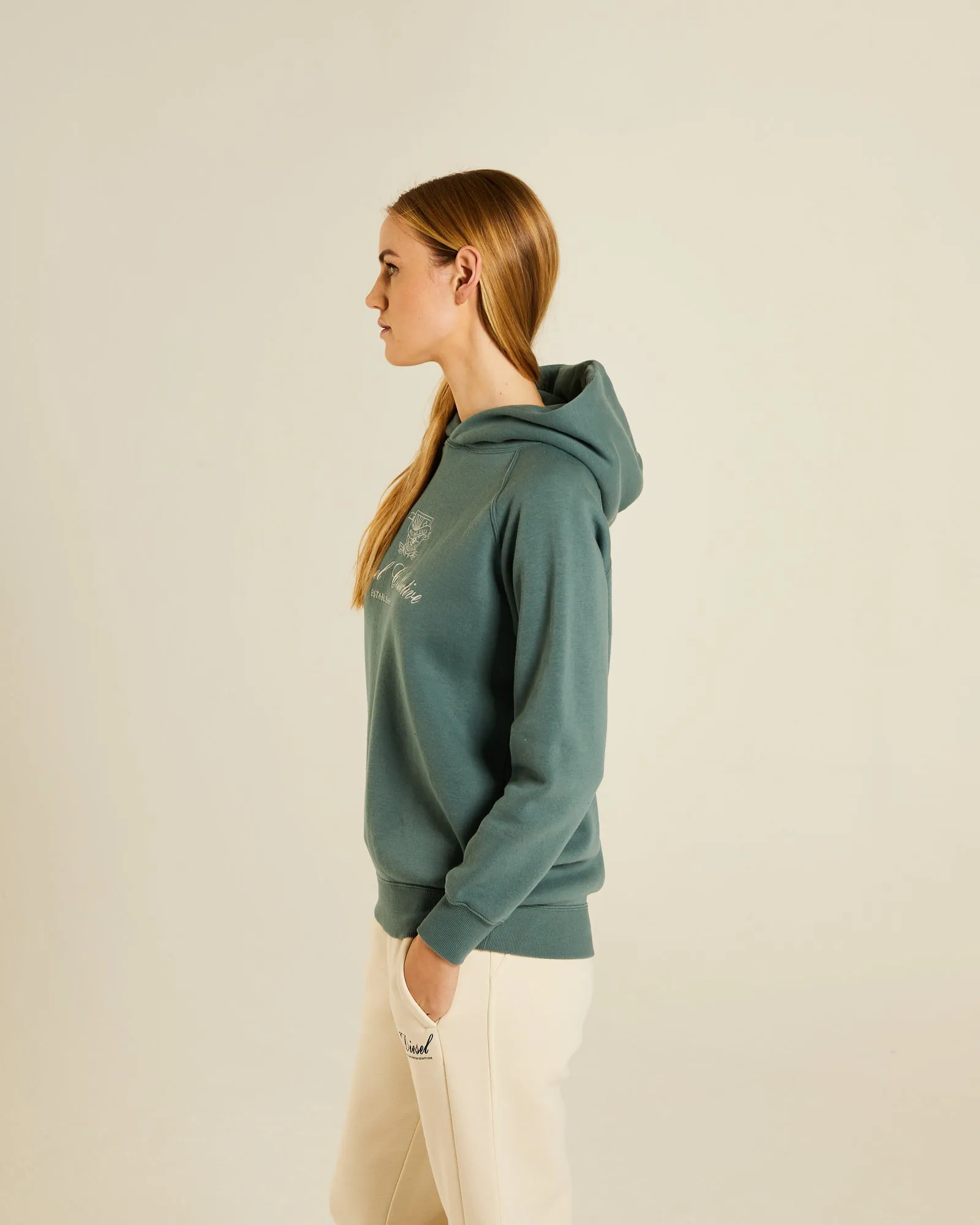 Bella Hood Green Trail label accents