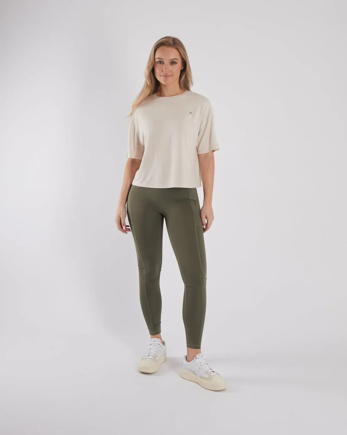 Evie Tee Birch White Chafe Free Armhole Hydrophobic coating